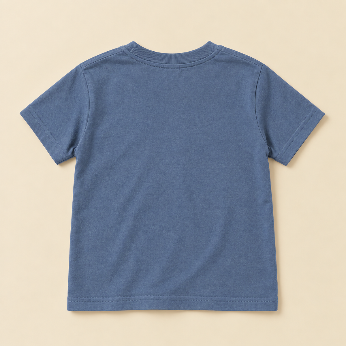 Blank back of Tag Champion kids tee in Blue Jean
