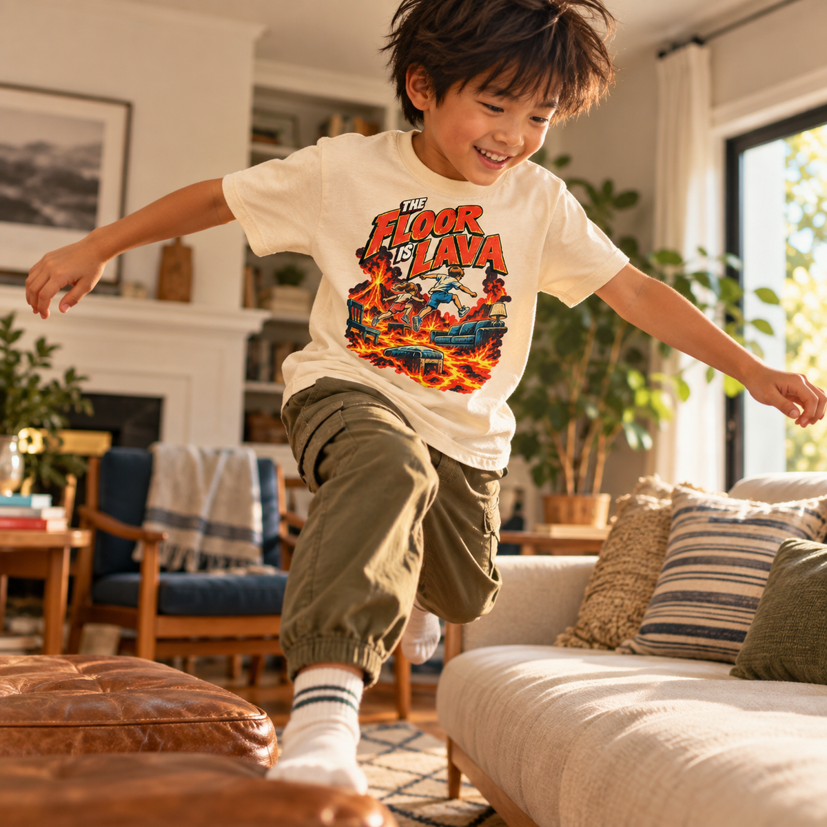 Kid wearing The Floor Is Lava natural graphic tee